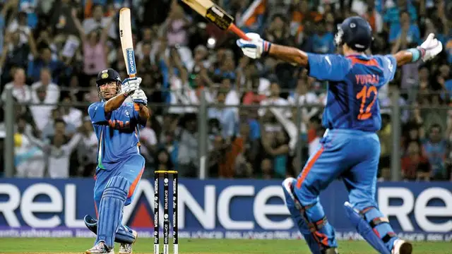 2011 இந்தியா vs இலங்கை போட்டியில் தோனி அடித்த அந்த சிக்ஸர் – நினைவிடமாக மாற்றப்பட்ட வான்கடே மைதானம் வீடியோ உள்ளே.